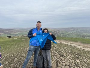 Isaac with his dad and his Together Plan sweatshirt